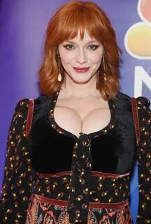 Mad Men star Christina Hendricks stuns in figure-hugging dre