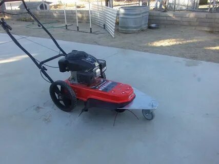 Ariens walk behind string trimmer with Awesome Wheel Attachm