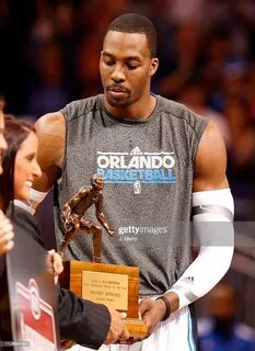 Dwight Howard of the Orlando Magic receives his Defensive Pl