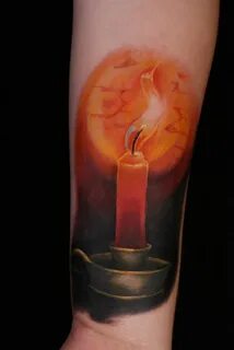 Realistic candles tattoo on forearm by Austin at Transformat