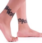 hand Implications cheekbone tattoo paw prints flower vines a