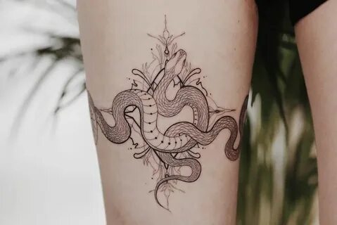 Perfectly intertwined snakes tattoo on the right thigh Thigh