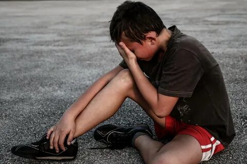 Download Crying Sad Boy Side Angle Wallpaper Wallpapers.com