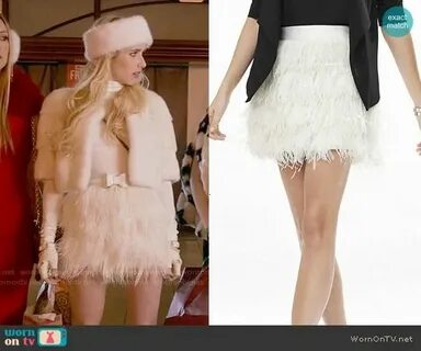 Chanel’s white cropped fur jacket and feather skirt on Screa