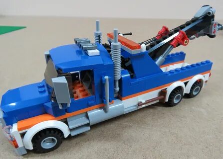 How to build a Lego tow truck visit https://www.youtube.com/watch?v=JWcRcXqoMgQ 