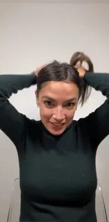 AOC Tying Hair (meme template) AOC Tying Her Hair Know Your Meme