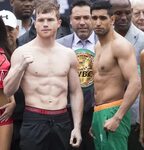 Boxers Saul "Canelo" Alvarez, left, and Amir Khan 