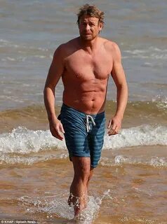 Liev Schreiber and Simon Baker hit the beach in Sydney with 