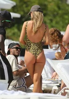 Doutzen Kroes displaying her hot body in a thong leopard pri