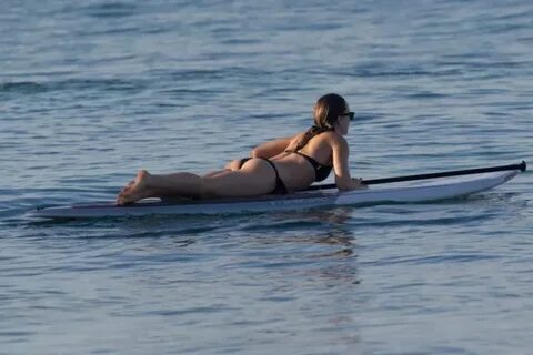 Olivia Wilde in a Bikini Paddle Board in Hawaii, December 20