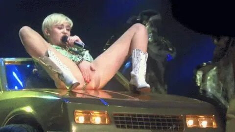 Miley cyrus legs spread on stage Picsegg.com