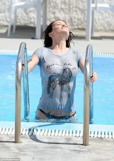 Jess Impiazzi flaunts her sizzling figure in a wet T-shirt D