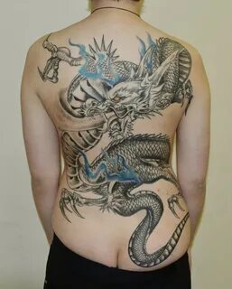 Татуировка на спине у девушки - дракон - KissMyTattoo.ru
