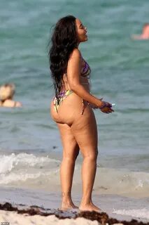 Angela Simmons shows off her curves in a string bikini in Mi