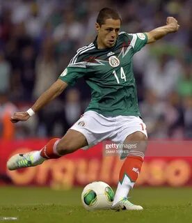 Footballer Javier Hernandez of Mexico takes a penalty kick o