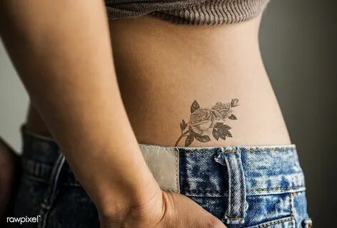 Closeup of lower hip tattoo of a woman premium image by rawp