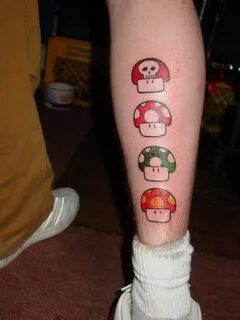 Mario Mushrooms Colored Tattoos On Back Leg Mario tattoo