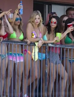 Selena Gomez and Vanessa Hudgens are surrounded by bikini ba