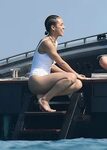 Nathalie Emmanuel - Spotted wearing a white swimsuit while o