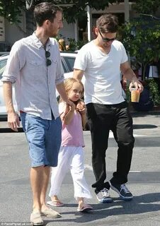 Tobey Maguire jogs alongside his daughter Ruby, 6, as she ge