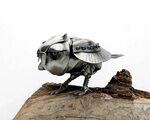 Metal sculpture Owl steampunk. Mechanical Owl figurine. Weld