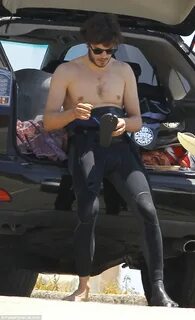 Father-to-be Adam Brody hits the beach for surfing session D