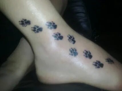 Dog Paw Prints Tattoo On Foot Tattoobite. Cheetah print tatt