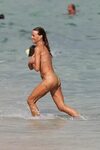 Kelly Bensimon Seen showcasing her bikini body in a 2 differ