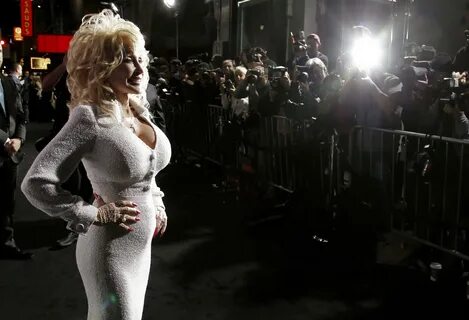 Dolly Parton busty wearing tight white dress at the 'Joyful 