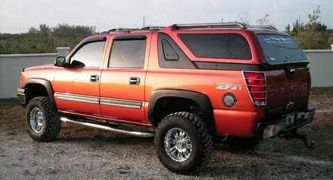 Chevy Avalanche sporting an impressive topper. Truck Caps, T