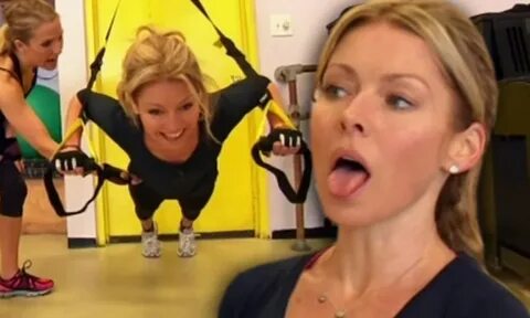 Kelly Ripa is put through her paces by a trainer during a gr