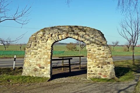 Stone arch near the road free image download