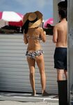 Bethenny Frankel Wears a floral two-piece swimsuit on Miami 