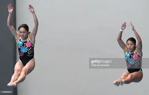 Malaysia's duo Leong Mun Yee and Ng Yan Yee perform a dive i