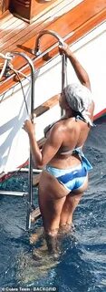 Regina King, 50, blisses out in blue bikini for a boat cruis