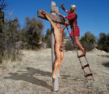 Crucified naked man