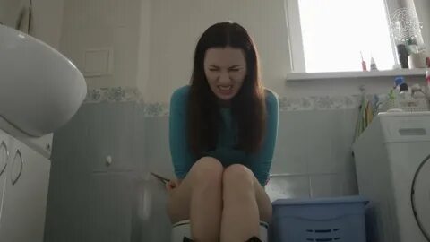 Young girl diarrhea toilet stock video footage