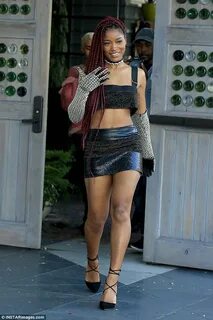 Keke Palmer shows off her toned legs in a bubble gum hued dr