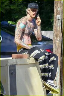 Machine Gun Kelly Shows Off Fully Tattooed Torso While Shirt