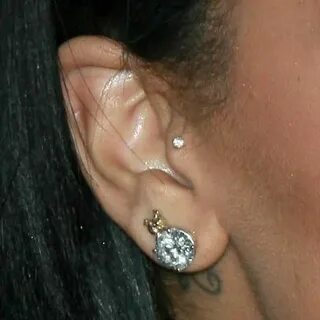 Rihanna Ear Lobe, Tragus Piercing Steal Her Style