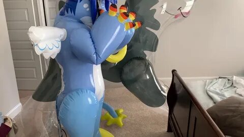 Inflating the pvc angel dragon suit - YouTube