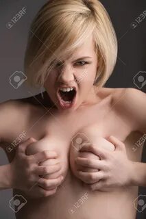 Nude Girl Holds Her Boobs.