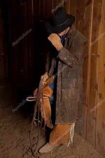 Cowboy leaning on wall Stock Photo by © alanpoulson 12101751