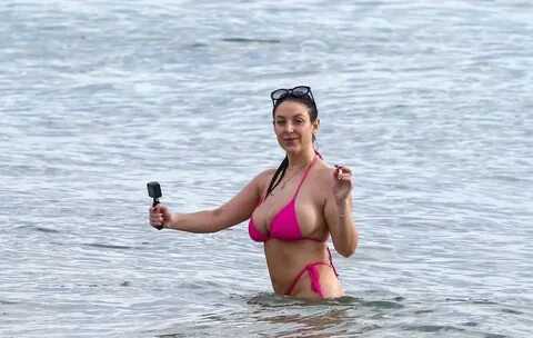 Angela White showcase her ample assets in a Pink bikini in M