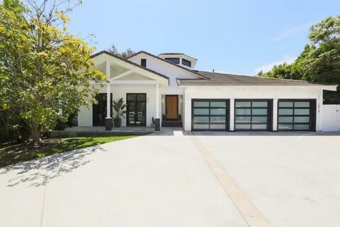 White Ranch House With Black Windows