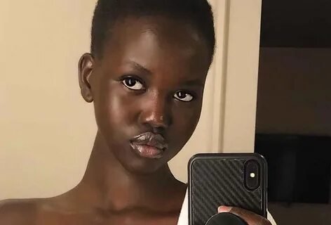 Model Adut Akech Preps For Met Gala With A 24-Karat Gold Mas