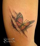 Butterfly through Ripped Skin Tattoo Ripped skin tattoo, Ski