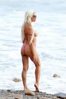 Angelique "Frenchy" Morgan spotted topless in a pink thong bikini...