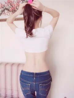 a slim girl in jeans takes off her Clothes one by one - Stee