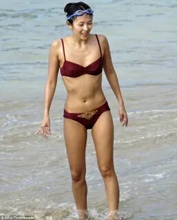 Zhang Ziyi pictured frolicking on beach with billionaire ex-